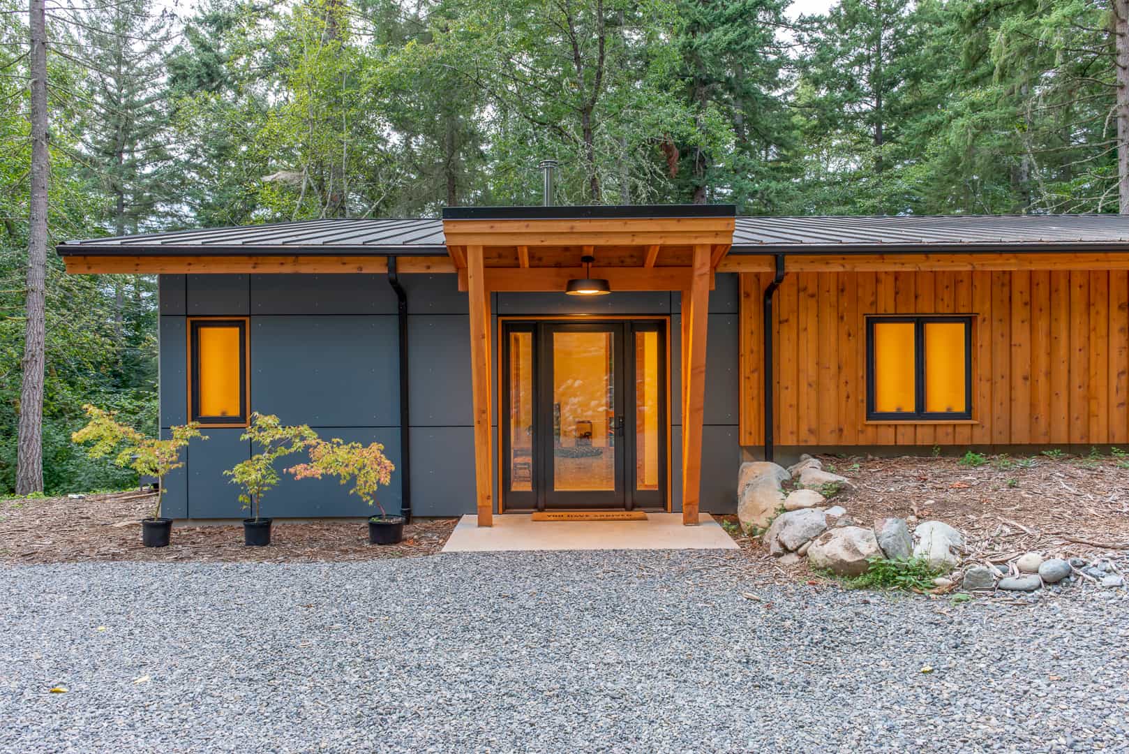 Custom FabCab home on Vashon Island surrounded by forest